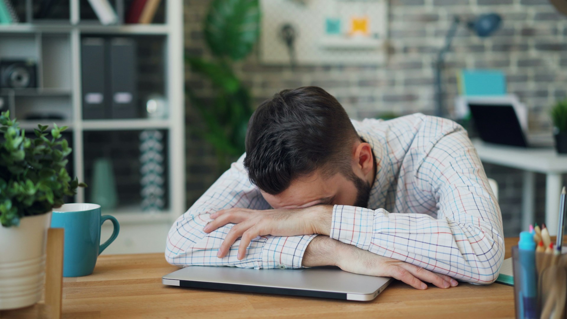 CTO in despair in a modern office environment